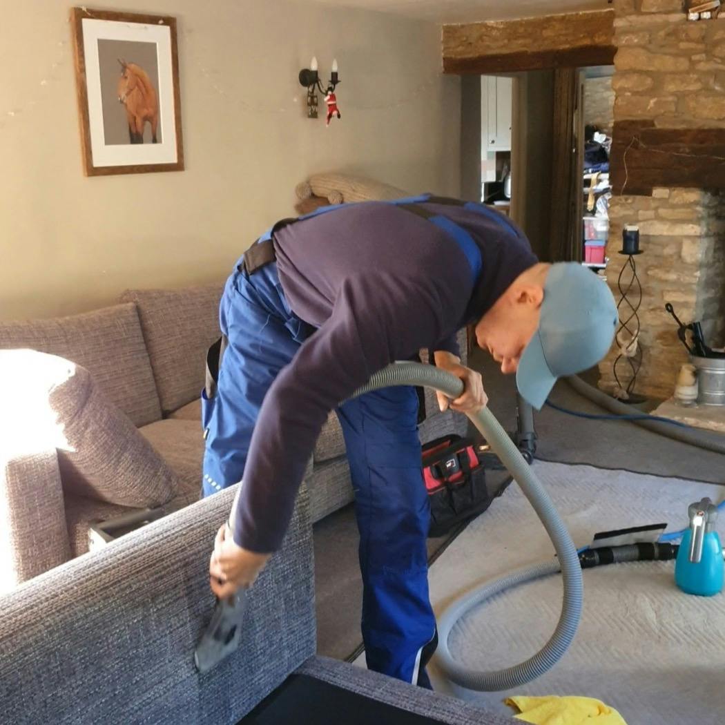 mike cleaning sofa